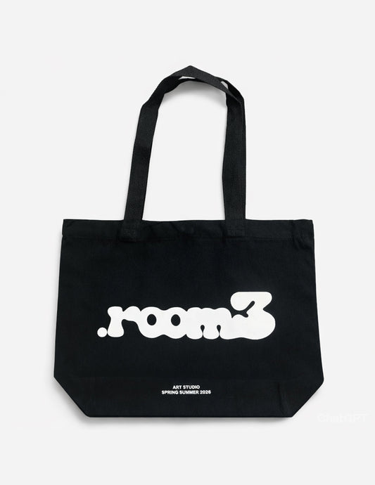 Black tote bag with 'room3' branding on a white background